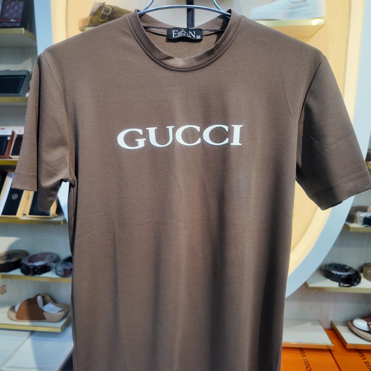 WhatsApp Image 2026-10-12 at 1.00.01 PM Premium Brown GUCCI Printed Crew Neck T-Shirt - Image 1